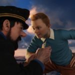 Zdjęcie przedstawia kadr z filmu animowanego "Przygody Tintina" na którym widać dwówch mężczyzn - kapitana statku i głównego bohatera Tintina